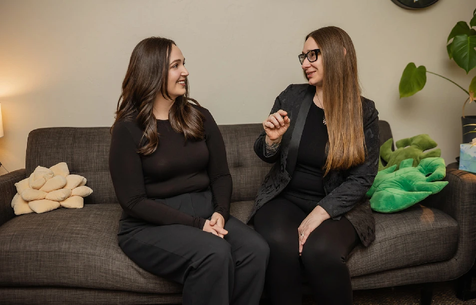 Two therapists talking together