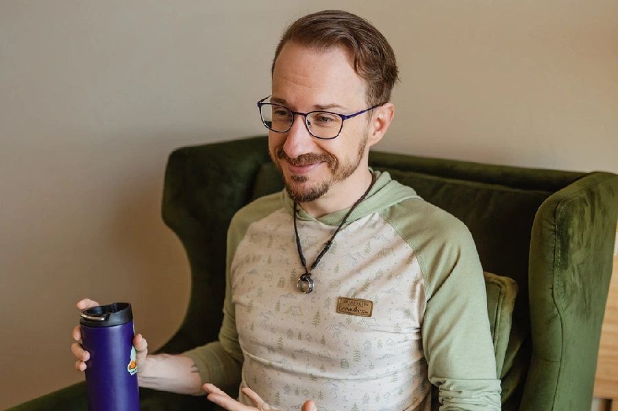 A therapist taking notes during a professional development session. 